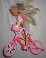 Bábika s bicyklom (2/2)